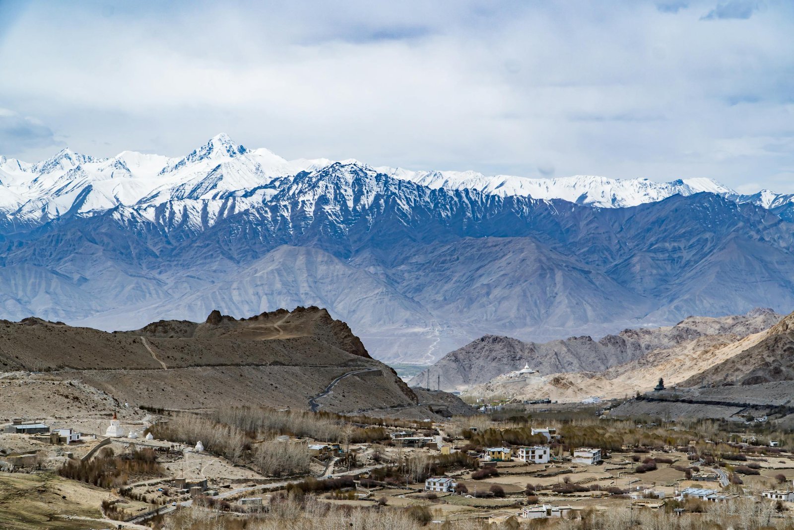 Breathtaking view of snow-capped Himalayan mountains and scenic Leh valley in India.