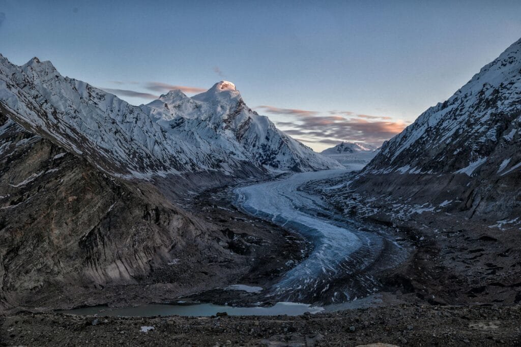 pexels-photo-18646449-18646449 Explore the breathtaking snow-covered peaks and glacier in Zanskar Valley with vibrant twilight skies.