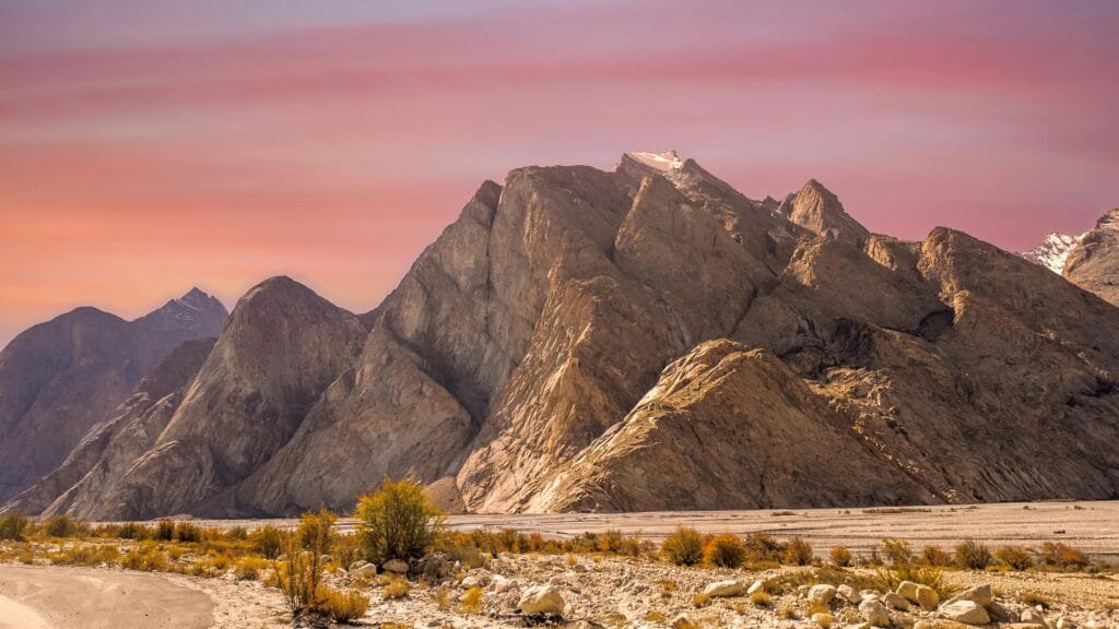 pexels-photo-29037107-29037107 Stunning view of rugged mountains under a vibrant sunset sky in Ladakh, India.